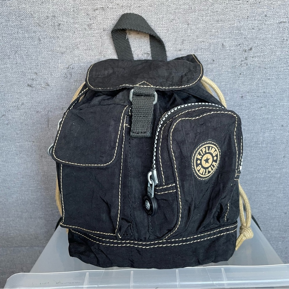 KIPLING 🐒 black with tan accents drawstring mini backpack